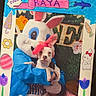 Raya is registered to the contest to win money with this photo: blue_jacket, carrot, celebration, costume, cute, decorations, dog, easter_bunny, festive, flowers, frame, hand_drawn, headband, holiday, person, pet, photo_frame, pink, portrait, spring
