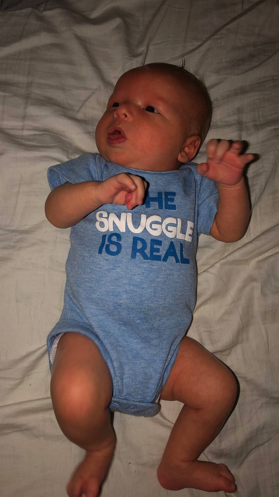 Greyson is registered to the contest to win money with this photo: abdomen, arm, baby, baby_products, baby_toddler_clothing, cheek, child, diaper, head, leg, mouth, muscle, person, product, sitting, skin, toddler