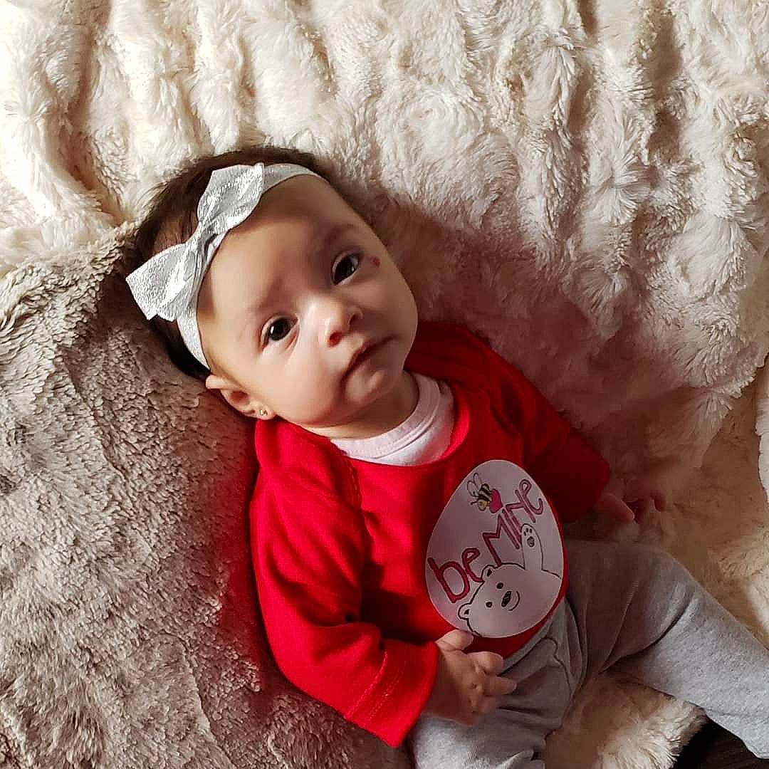 Teghan joined the competition — help win amazing prizes! baby, baby_sleeping, baby_toddler_clothing, bonnet, cheek, child, happy, headgear, person, photography, pink, portrait_photography, product, smile, toddler