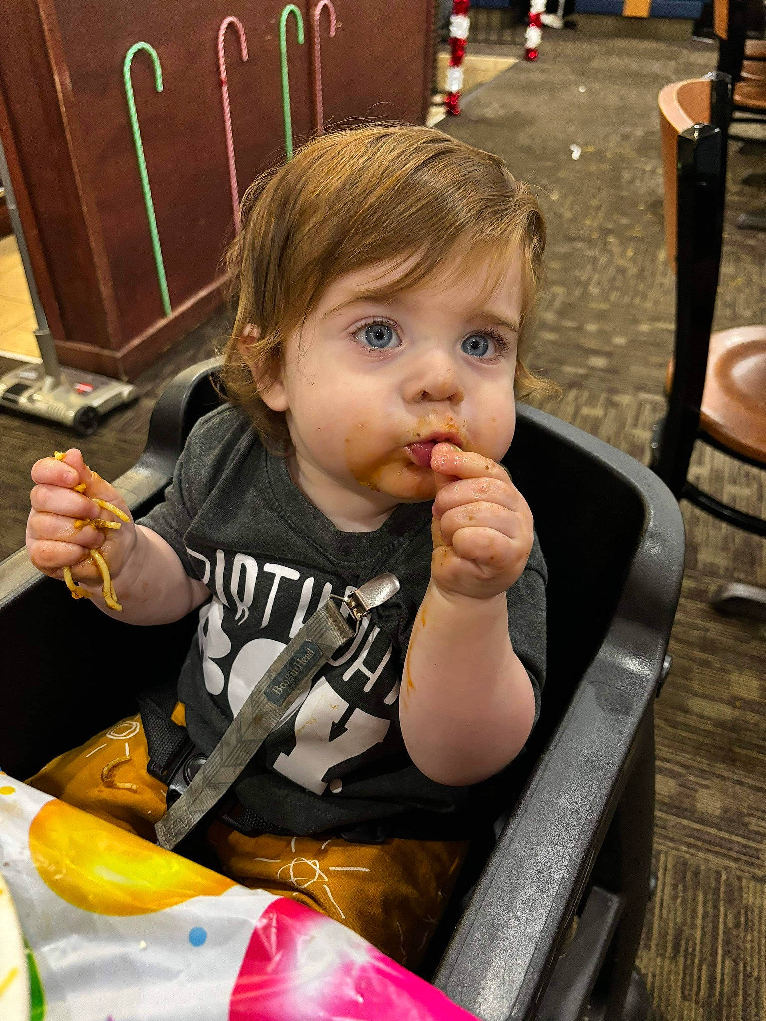 Tommie joined the competition — help win amazing prizes! baby, chair, child, comfort_food, fun, leisure, person, recreation, sitting, snapshot, t_shirt, tableware, thumb, toddler, vacation