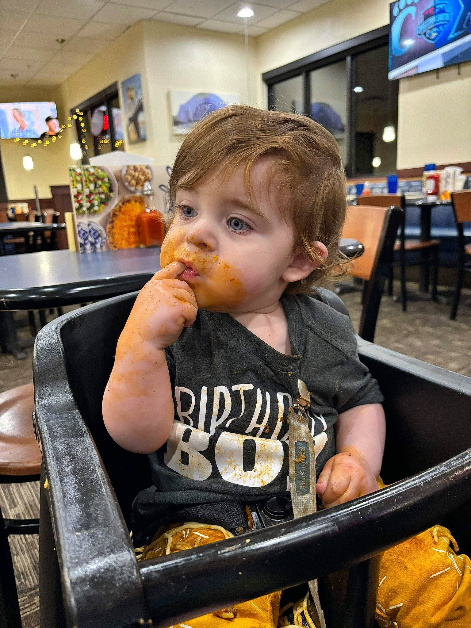 Tommie joined the competition — help win amazing prizes! baby, baby_products, baby_safety, chair, child, customer, fun, junk_food, person, recreation, room, sitting, t_shirt, table, television, toddler, vacation