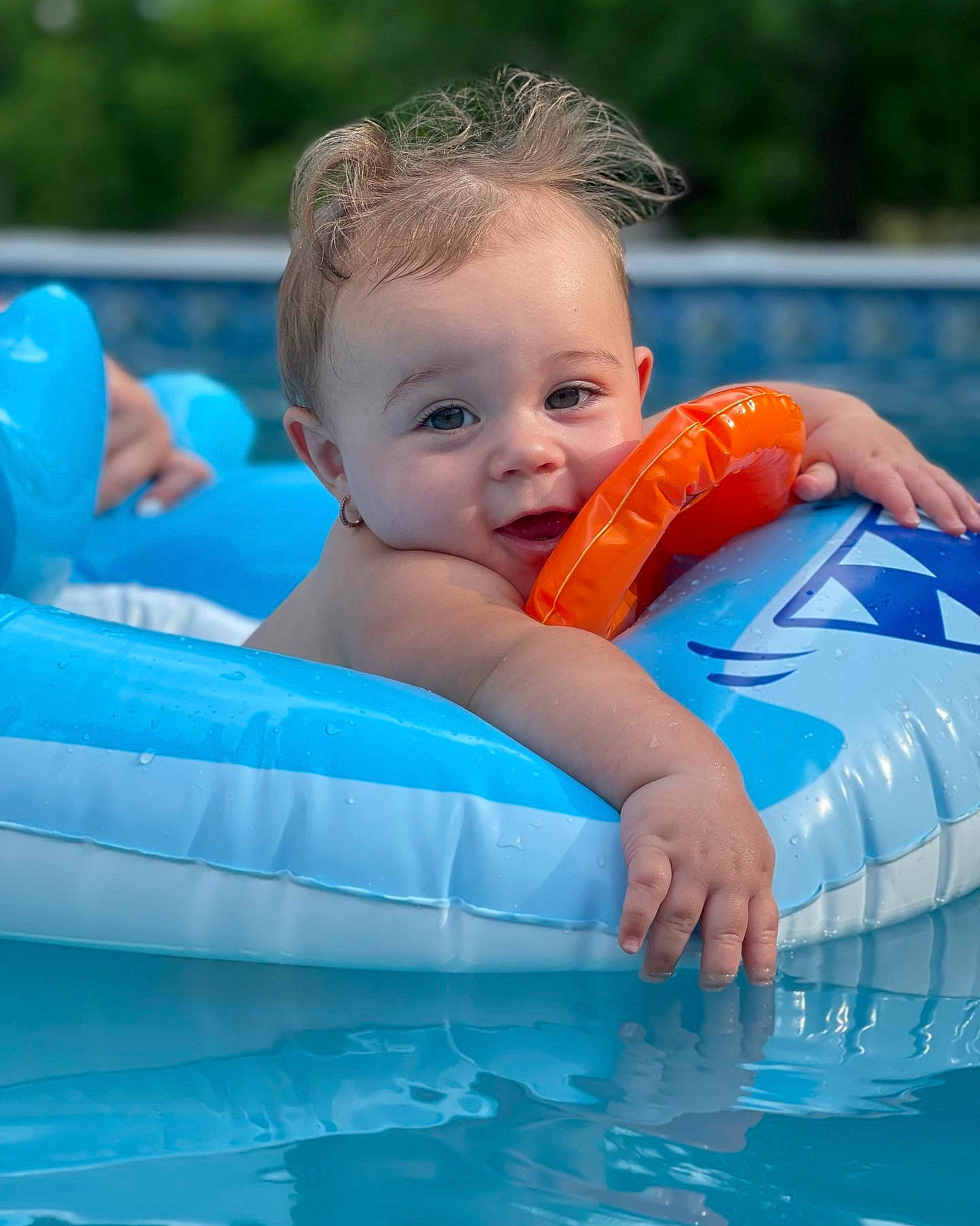 Demi joined the competition — help win amazing prizes! aqua, azure, bathing, blue, child, fluid, fun, happy, human_body, leisure, muscle, organ, outdoor_recreation, people, person, recreation, smile, summer, swimming_pool, toddler