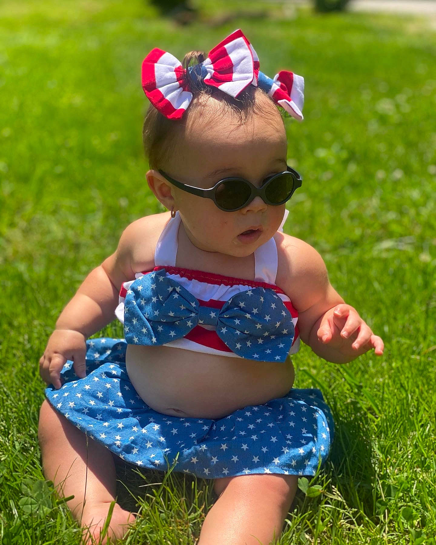 Demi joined the competition — help win amazing prizes! baby, baby_toddler_clothing, child, electric_blue, eyewear, fun, glasses, goggles, grass, happy, leaf, leisure, pattern, person, photograph, plant, summer, sunglasses, thigh, toddler