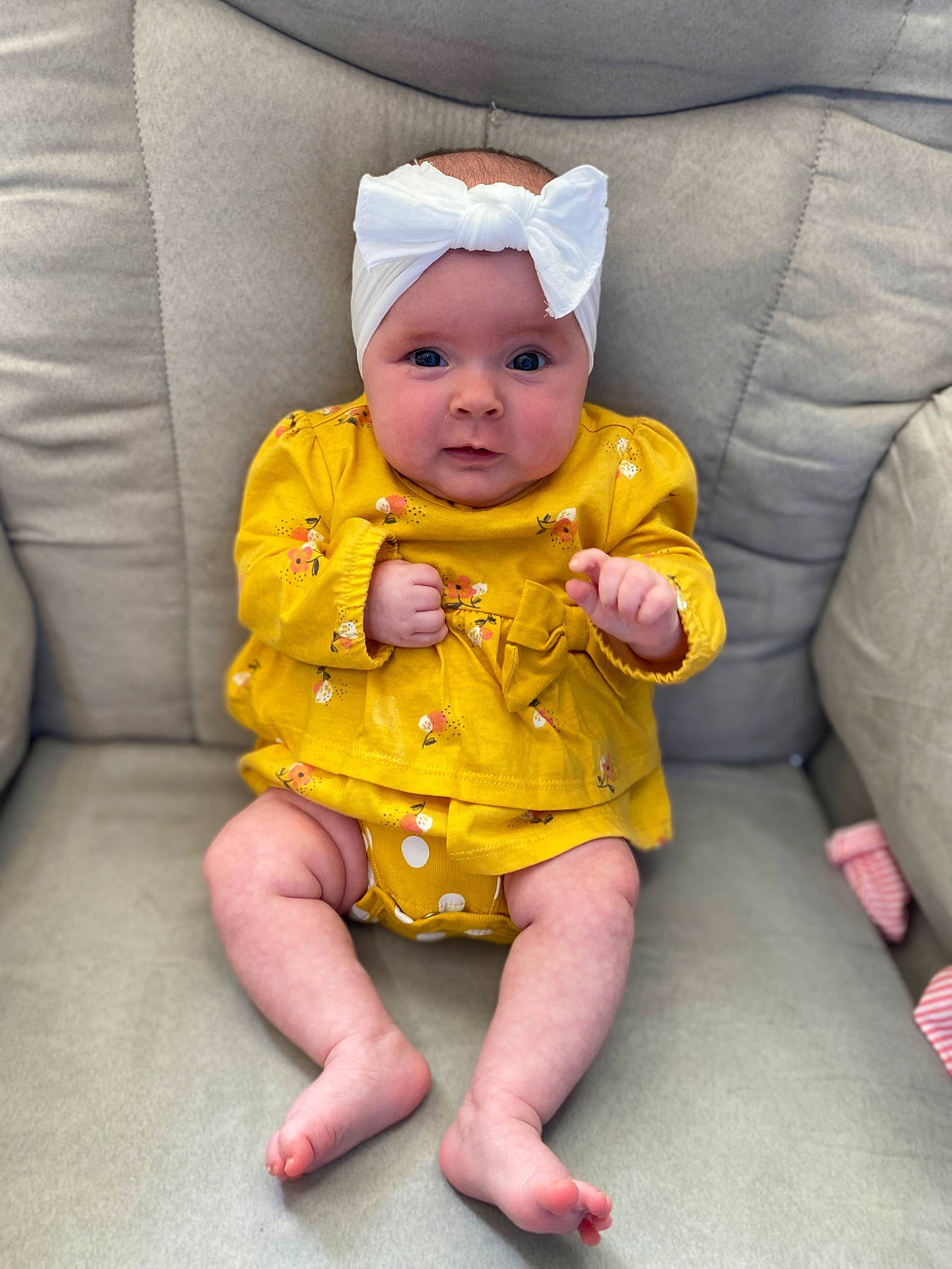 Augustine joined the competition — help win amazing prizes! baby, baby_products, baby_toddler_clothing, cheek, child, comfort, couch, foot, fun, happy, headwear, human_leg, lap, linens, person, room, sitting, sleeve, throw_pillow, thumb