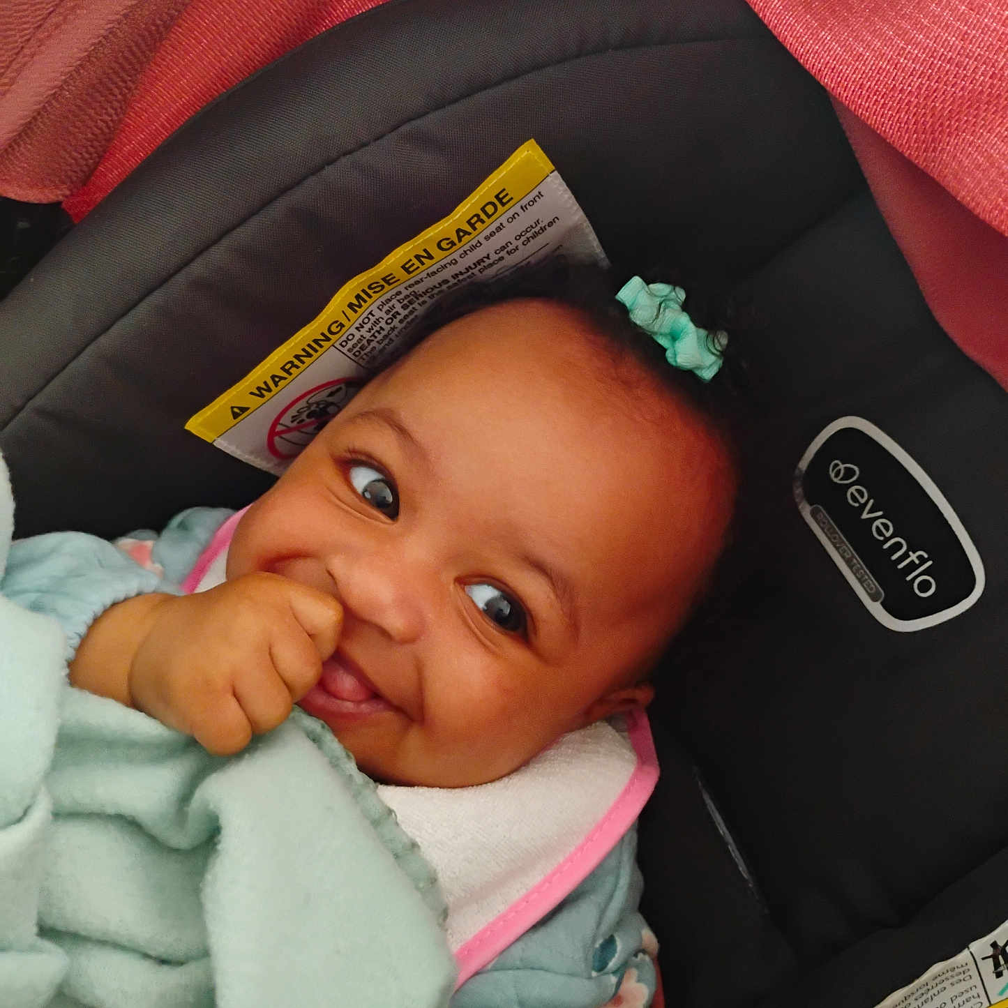 Miracle is registered to the contest to win money with this photo: baby, bodypart, car, car_interior, carseat, clothing, crib, cushion, face, finger, furniture, hand, head, homedecor, infantbed, person, photography, portrait, transportation, vehicle