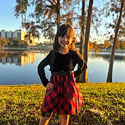 Jennifer joined the competition — help win amazing prizes! child, girl, smiling, dress, outdoor, lake, trees, sunlight, grass, autumn, nature, portrait, standing, happy, fashion, young, daylight, water, reflection, park
