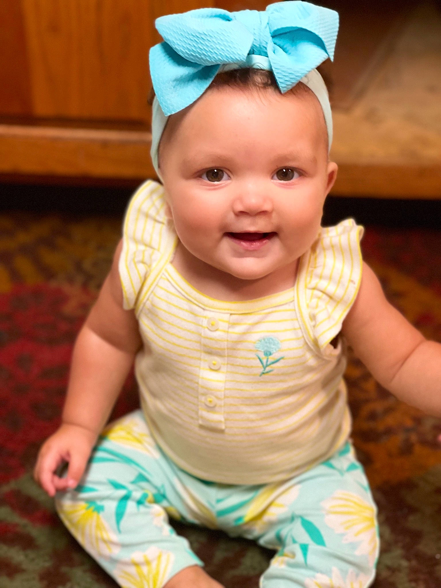 Avionna is registered to the contest to win money with this photo: baby, baby_toddler_clothing, blue, cap, cheek, child, chin, costume_hat, dress, eye, face, happy, head, human_body, iris, joy, person, pink, skin, sleeve