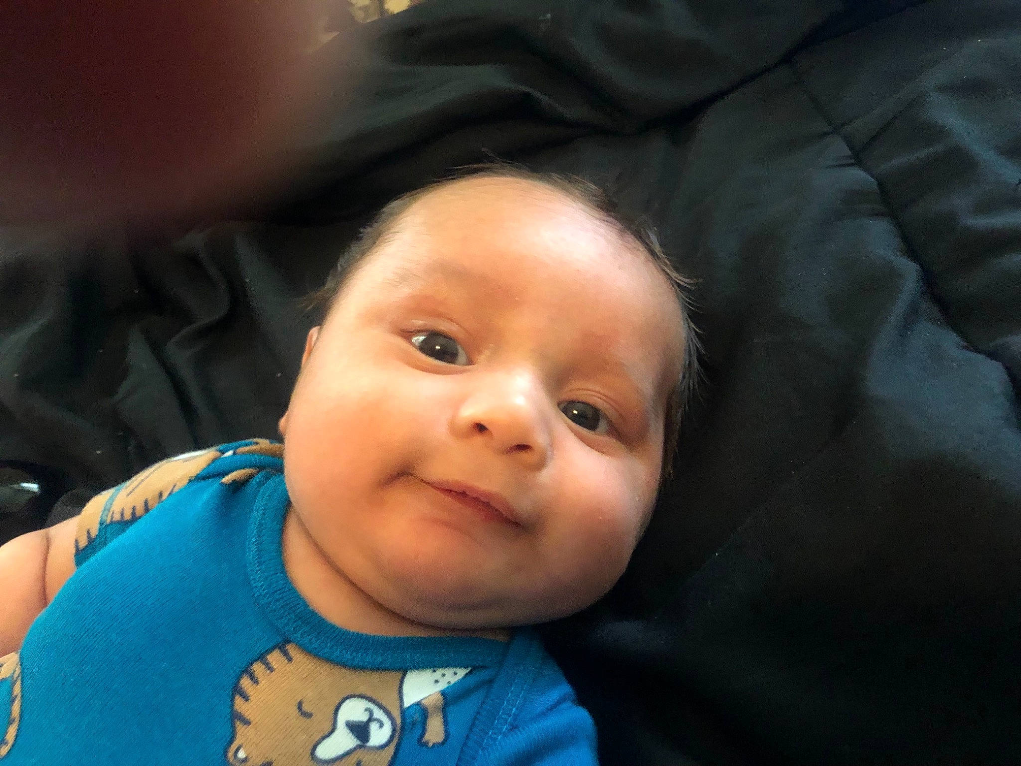 Damian is registered to the contest to win money with this photo: baby, baby_toddler_clothing, cheek, chin, comfort, cool, eyebrow, eyelash, finger, flash_photography, forehead, happy, headwear, iris, lip, mouth, neck, nose, person, skin