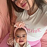 Kaylanna joined the competition — help win amazing prizes! baby, woman, child, headband, pink_clothing, white_shirt, couch, smile, indoor, portrait, matching_outfits, family, cute, baby_girl, young_adult, happy, people, sitting, closeup, love