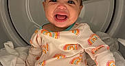 Kaylanna joined the competition — help win amazing prizes! baby, child, smiling, pajamas, rainbow_pattern, laundry, dryer, appliance, indoors, white_clothes, cute, happy, infant, sitting, face, clothing, home, playful, bright, clean