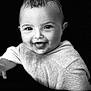 baby, baby_clothing, black_background, cheeks, child, closeup, cute, expression, eyes, face, happy, head, infant, person, portrait, smiling, sweater, tongue, wet_mouth, young_child