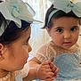 Mariam is registered to the contest to win money with this photo: toddler, child, mirror, reflection, blue_dress, headband, polka_dot, holding_hands, curly_hair, earrings, portrait, indoor, soft_light, sheer_curtains, cute, baby_girl, close_up, fashion, adorable, young_child
