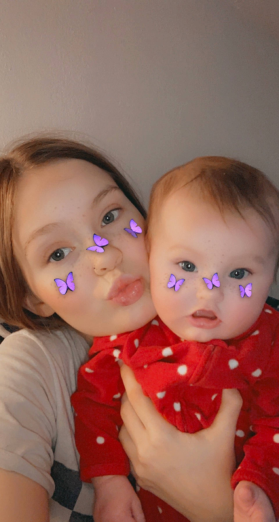Ava is registered to the contest to win money with this photo: baby, baby_toddler_clothing, brown_hair, cheek, chin, ear, eyelash, finger, fun, gesture, happy, hug, human_body, iris, lip, mouth, neck, nose, person, skin