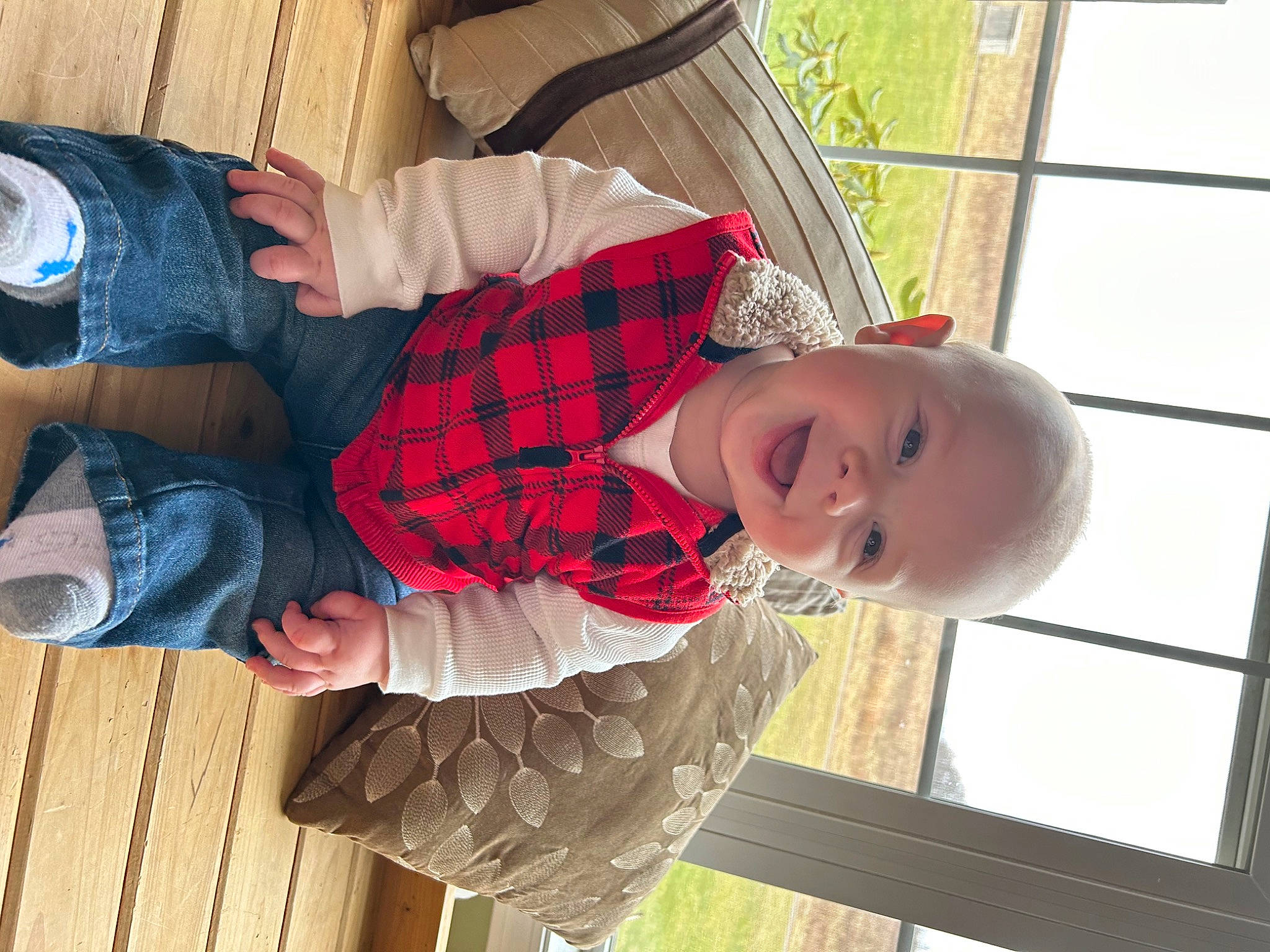 Johnny joined the competition — help win amazing prizes! baby_toddler_clothing, child, denim, fence, fun, happy, hat, leisure, pattern, person, plaid, plant, sitting, smile, sock, tartan, toddler, tree, vacation, wood