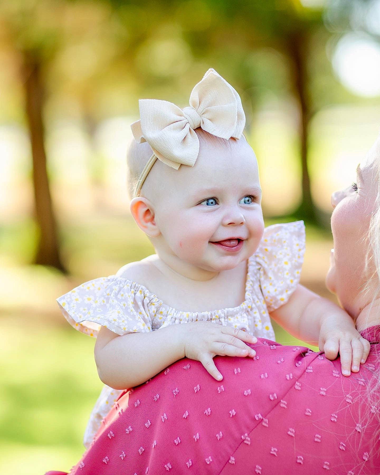 Wreese joined the competition — help win amazing prizes! baby, baby_toddler_clothing, child, embellishment, fashion_accessory, flash_photography, fun, grass, hair_accessory, happy, headband, headpiece, joy, laugh, magenta, pattern, peach, person, pink, portrait_photography
