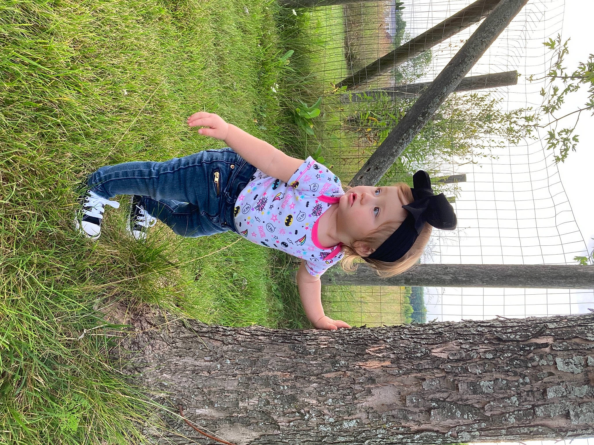 Evelyn Rose is registered to the contest to win money with this photo: child, grass, headwear, leg, person, plant, tree, vacation