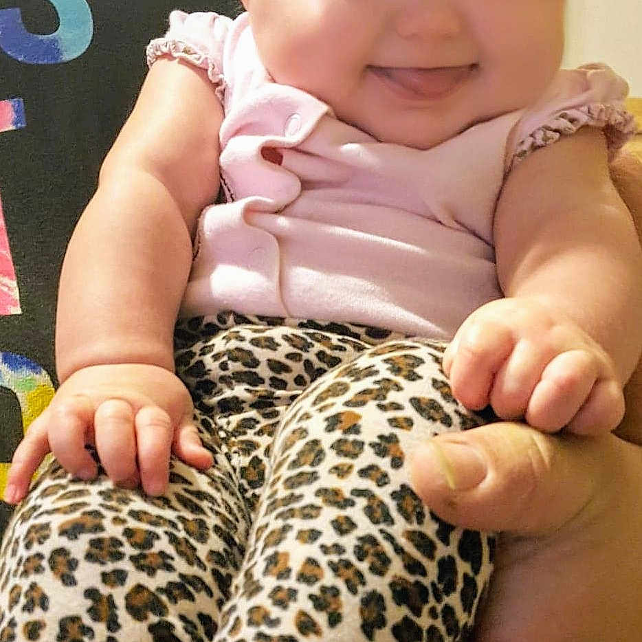 Raeann is registered to the contest to win money with this photo: arm, child, finger, girl, hair_accessory, hand, headgear, infant, joy, leg, nail, person, product, toddler