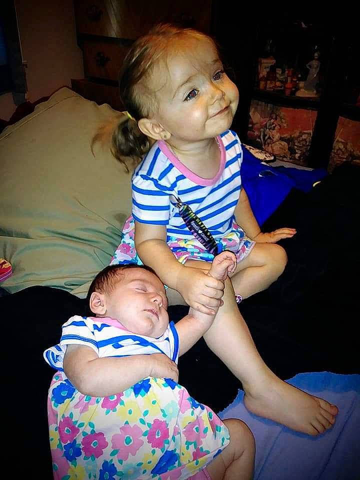 Ember is registered to the contest to win money with this photo: abdomen, arm, child, day, eye, fun, girl, hair, human_body, human_hair_color, infant, joy, leg, mother, organ, person, product, sitting, skin, smile