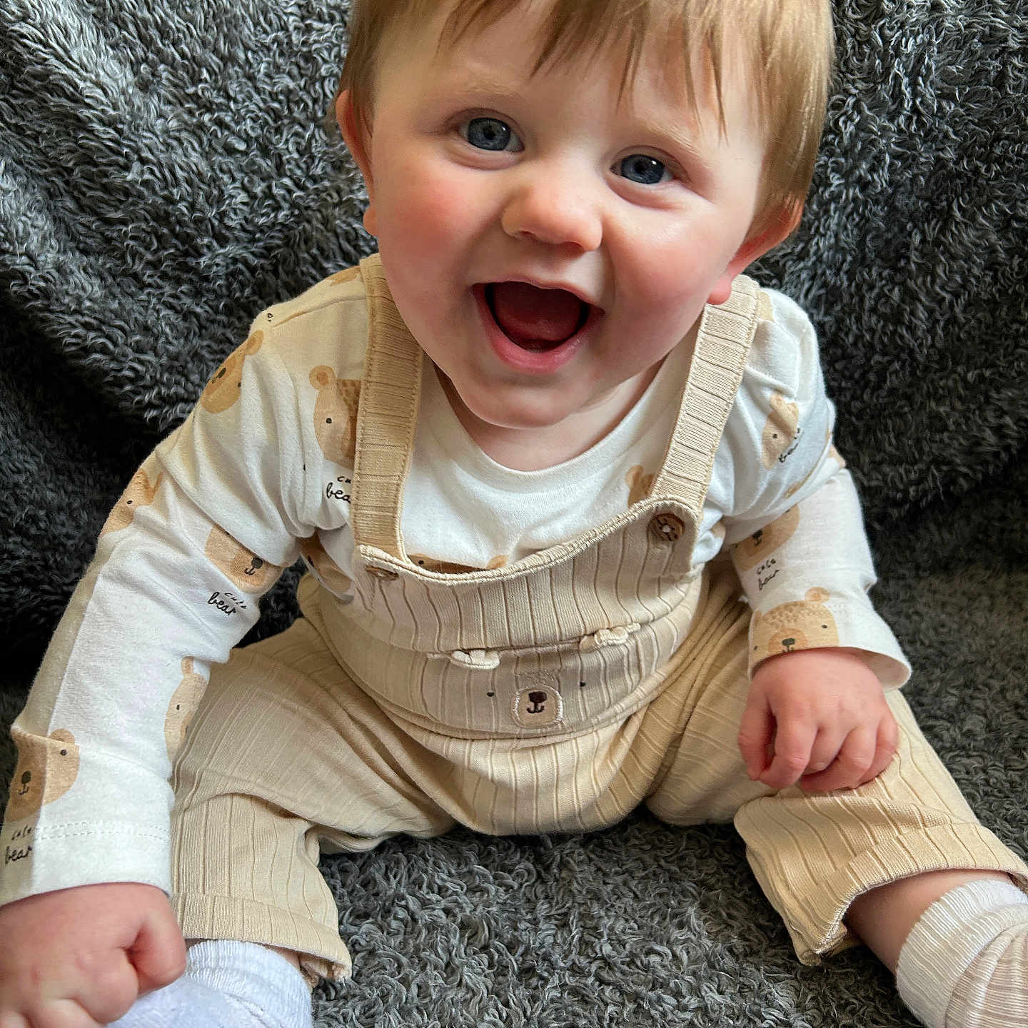 Toby joined the competition — help win amazing prizes! baby, babylaughing, blonde, bodypart, clothing, face, finger, hand, happy, head, hosiery, jeans, laughing, pants, person, photography, portrait, sitting, smile, sock