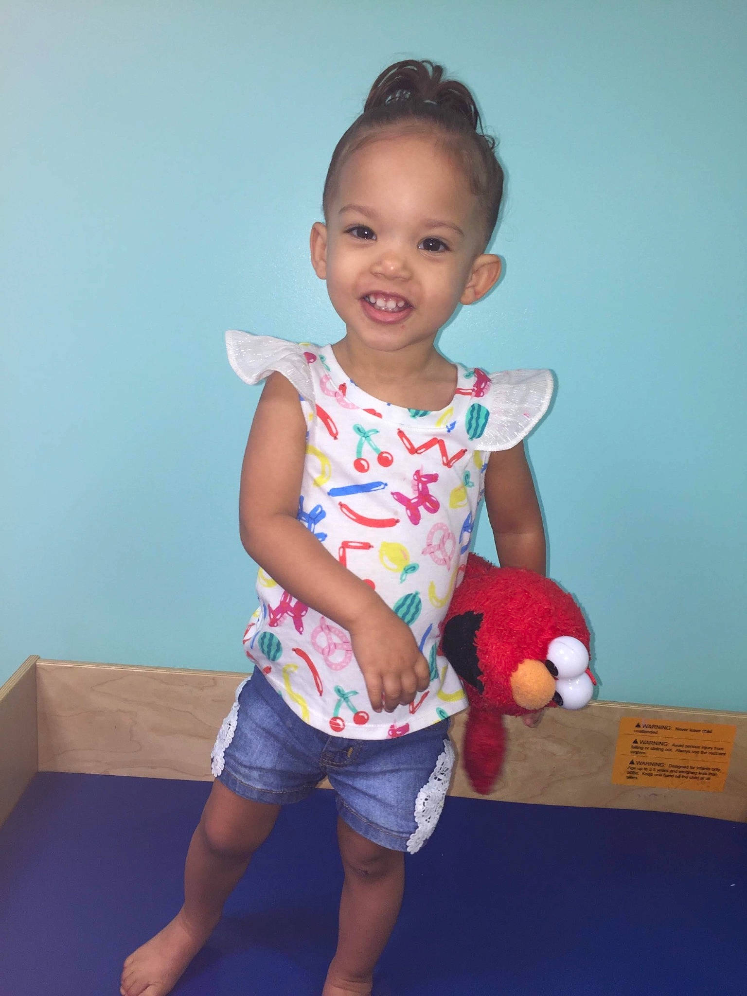 Destiney is registered to the contest to win money with this photo: arm, baby, baby_toddler_clothing, child, fun, happy, joint, joy, neck, person, play, shoulder, sitting, skin, smile, standing, t_shirt, toddler, vacation