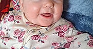 Rylee is registered to the contest to win money with this photo: applique, baby, blanket, bodypart, couch, face, finger, furniture, hand, happy, head, homedecor, linen, newborn, pattern, person, photography, portrait, quilt, smile