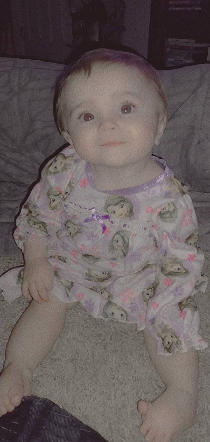 Rosie-maria joined the competition — help win amazing prizes! baby, baby_toddler_clothing, cheek, child, chin, eye, eyebrow, forehead, head, human_body, iris, lip, neck, nose, outerwear, person, sitting, skin, sleeve, smile