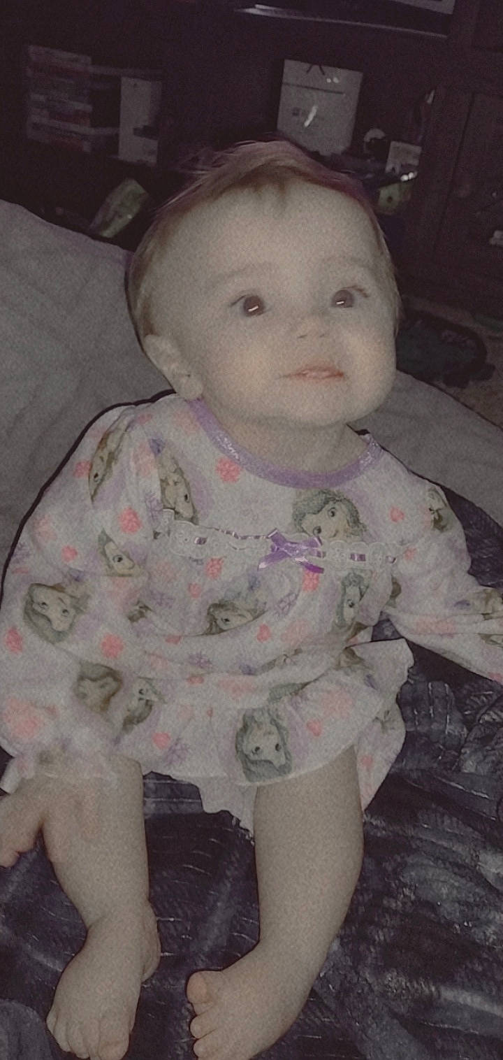 Rosie-maria is registered to the contest to win money with this photo: baby, baby_products, baby_toddler_clothing, cheek, child, comfort, eyelash, happy, head, iris, lip, mouth, nose, person, pink, sitting, skin, sleeve, smile, toddler