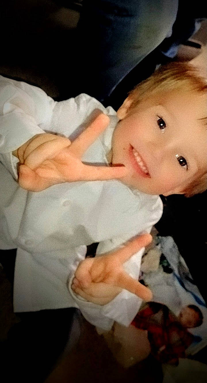 Kyler Zane is registered to the contest to win money with this photo: arm, baby, baby_products, baby_toddler_clothing, cheek, child, comfort, elbow, eyelash, finger, gesture, hand, happy, hat, joy, nail, person, sleeve, smile, thumb