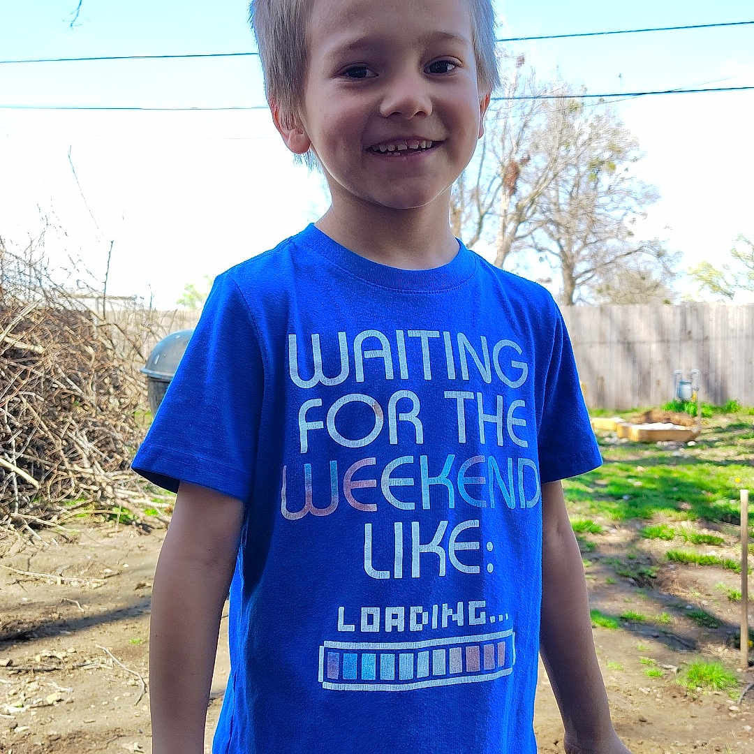 Kyler Zane is registered to the contest to win money with this photo: boy, child, clothing, face, grass, head, male, nature, outdoors, pants, person, photography, plant, portrait, shirt, shorts, soil, t_shirt, tree, yard
