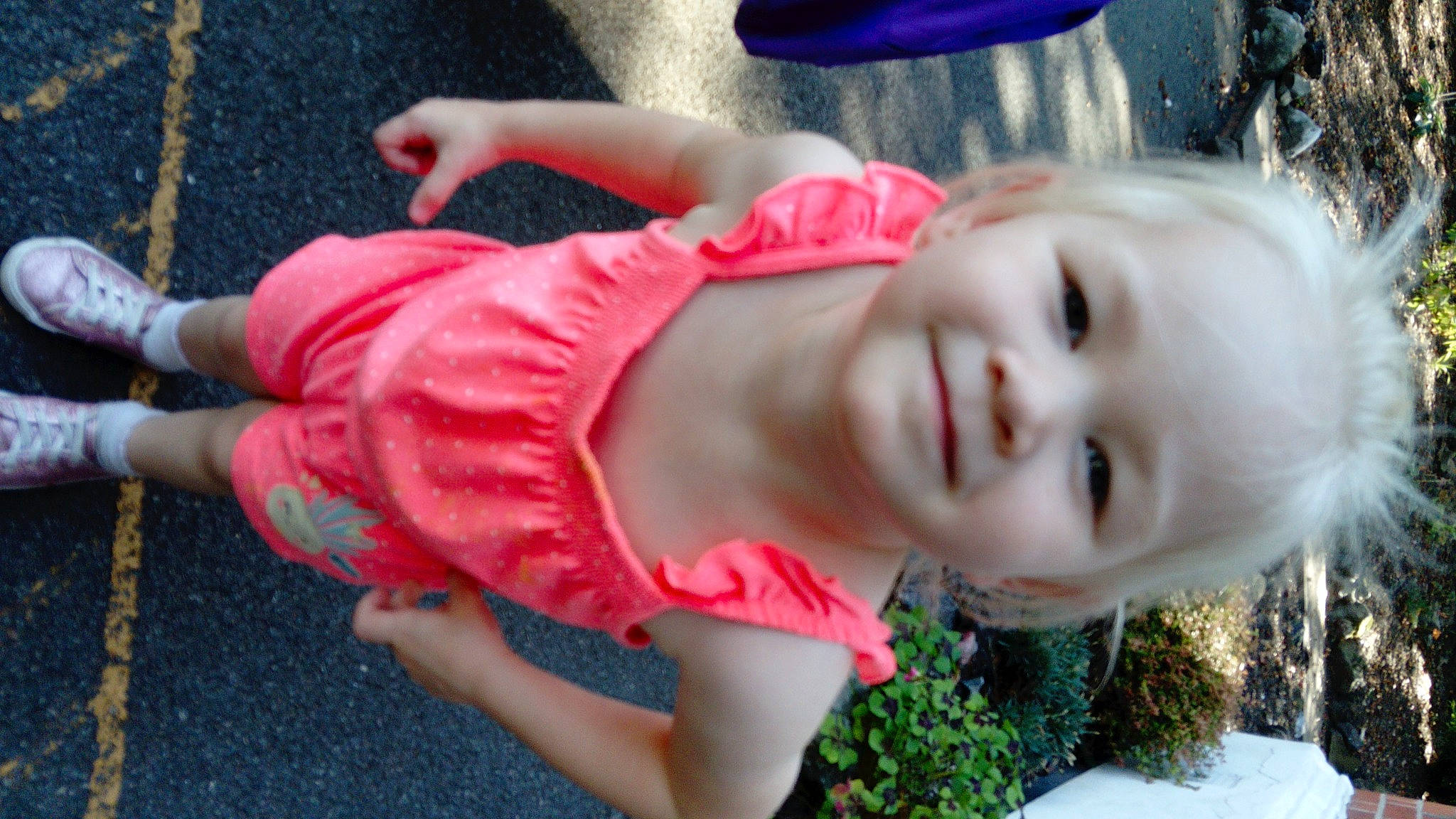 Leah is registered to the contest to win money with this photo: baby_laughing, baby_toddler_clothing, cheek, eye, fun, grass, happy, joy, leisure, lip, magenta, mouth, nose, person, photograph, pink, plant, skin, smile, snapshot