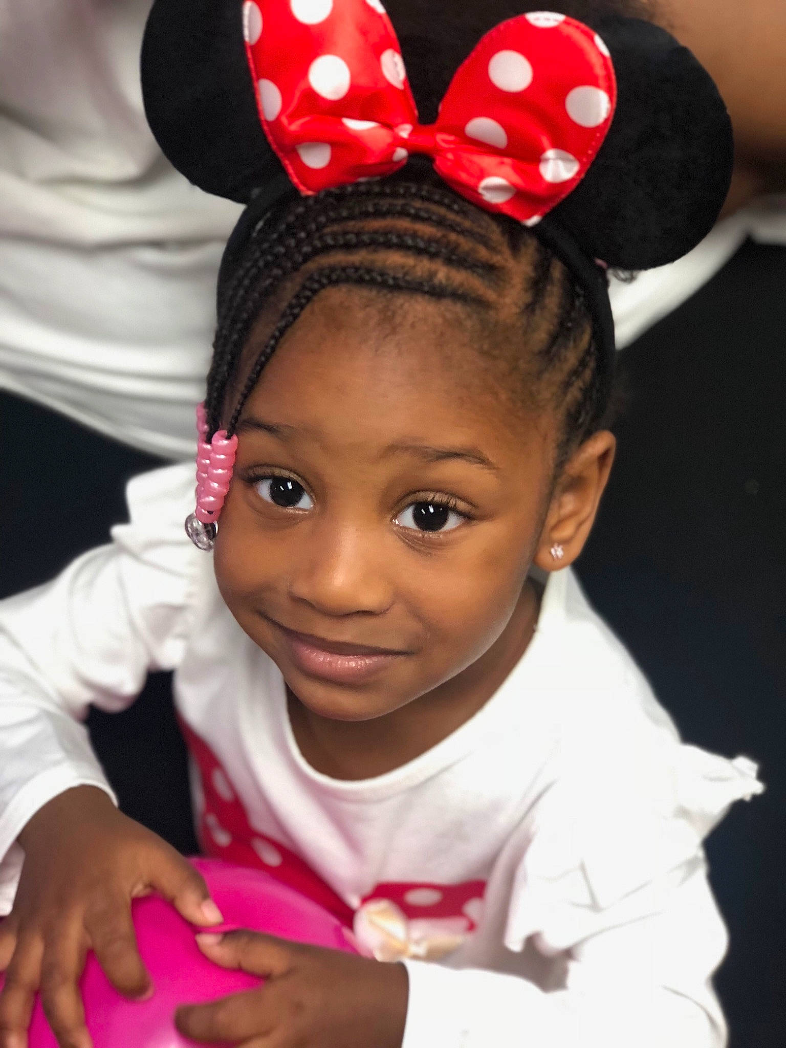 Amiayah Zackery joined the competition — help win amazing prizes! child, ear, fashion_accessory, fun, girl, hair_accessory, hat, headband, headgear, headpiece, joy, organ, person, pink, product, smile, toddler