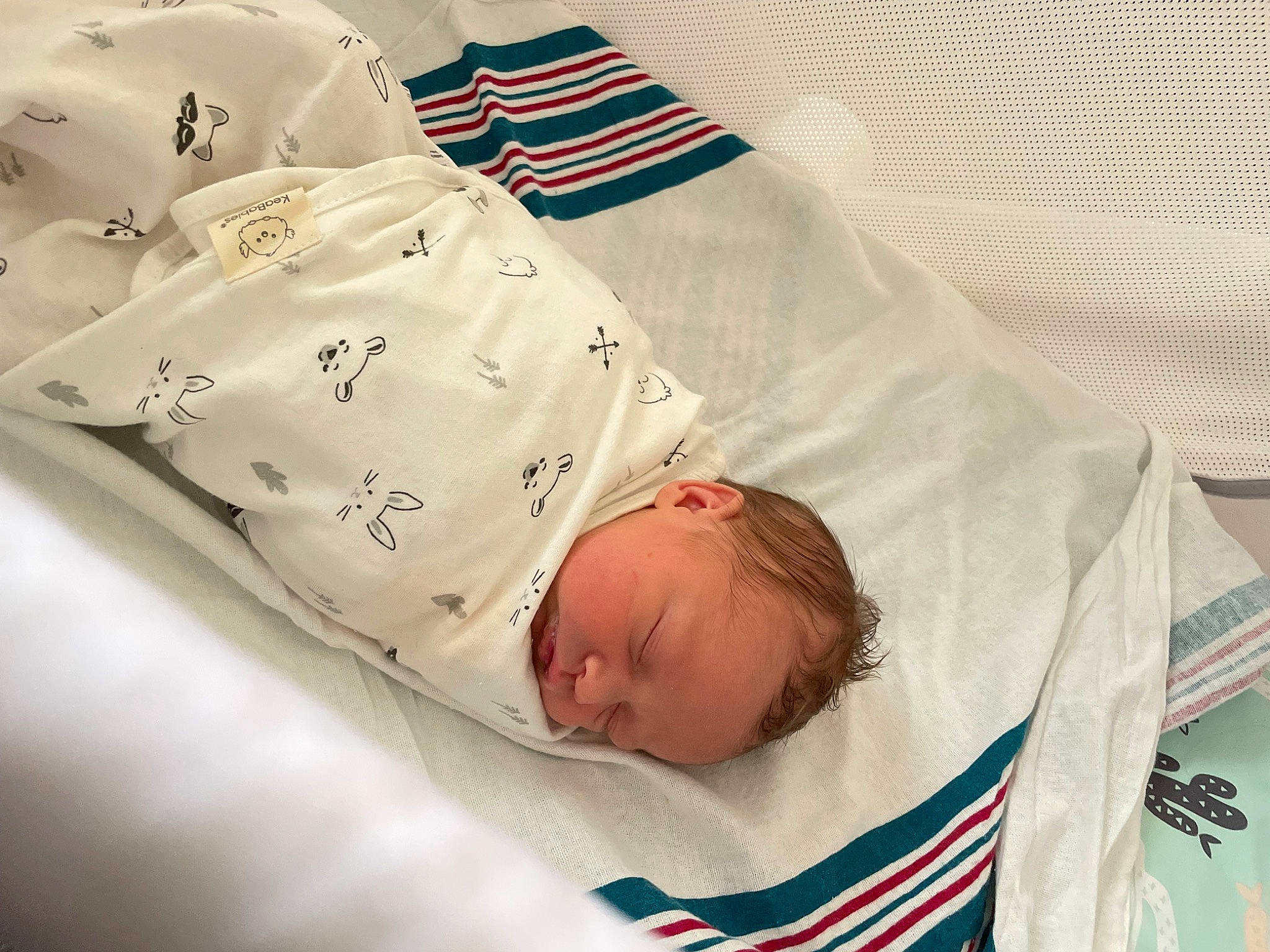 Jayden is registered to the contest to win money with this photo: baby, baby_products, baby_safety, baby_sleeping, baby_toddler_clothing, bed, bed_sheet, bedding, bedtime, carmine, child, comfort, event, flag_of_the_united_states, linens, nap, person, room, sleeve, textile