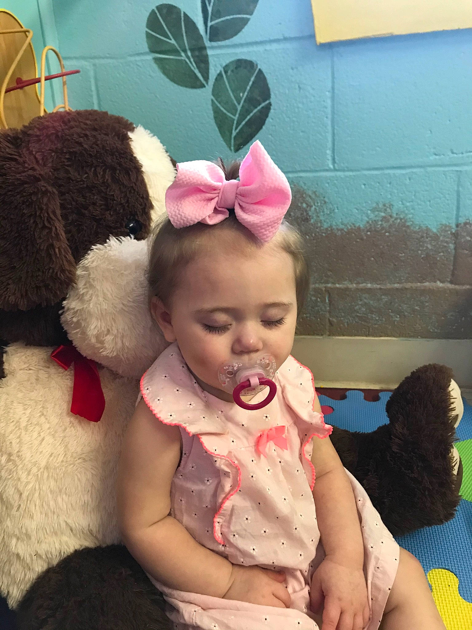 Hannah joined the competition — help win amazing prizes! arm, baby, child, ear, fashion_accessory, hair_accessory, happy, head, headgear, human_body, leg, neck, organ, person, pink, play, sitting, skin, stuffed_toy, toddler