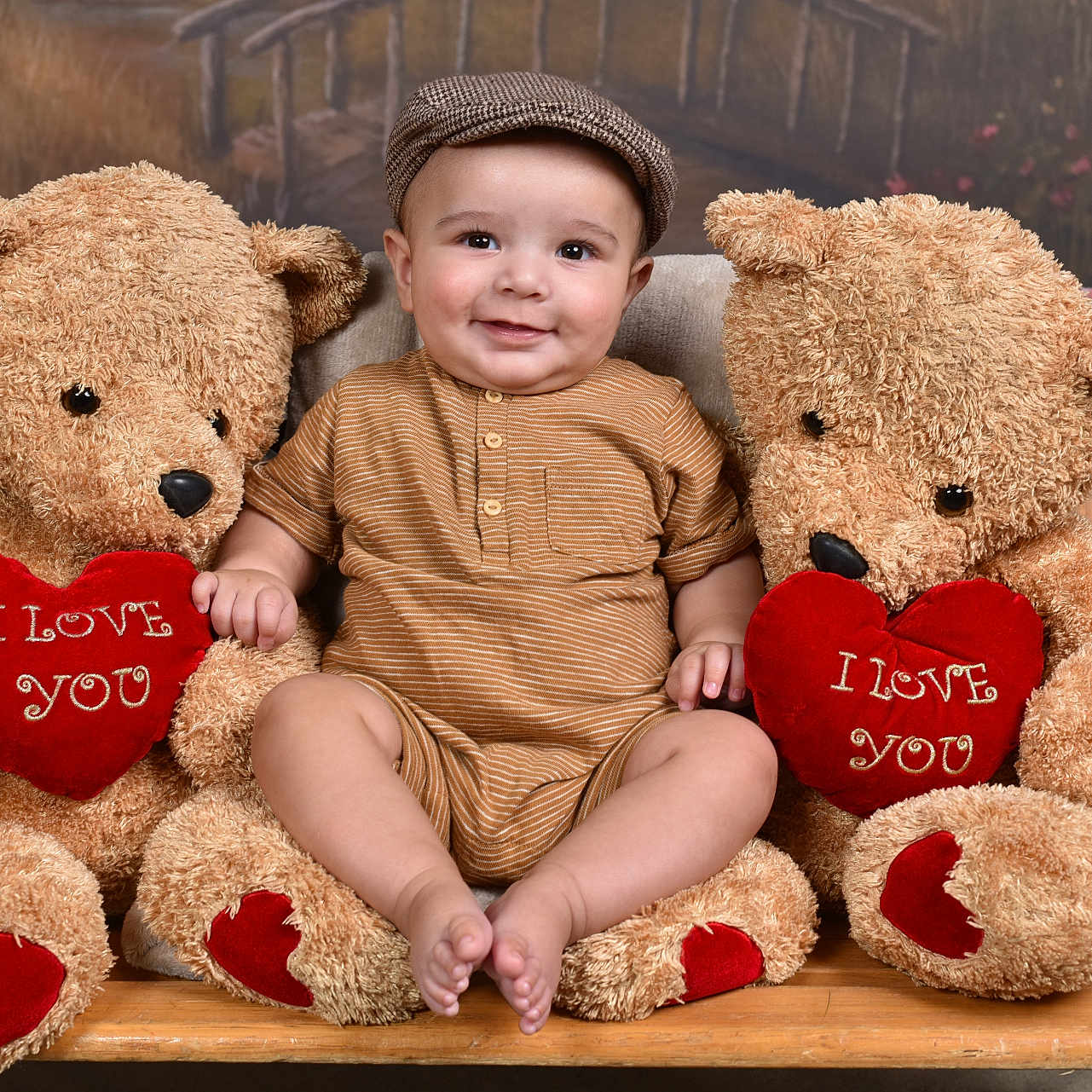 Edmund is registered to the contest to win money with this photo: baby, bodypart, cap, clothing, couch, face, finger, furniture, hand, hat, head, loveheartsymbol, person, photography, plush, portrait, sitting, symbol, teddybear, toy