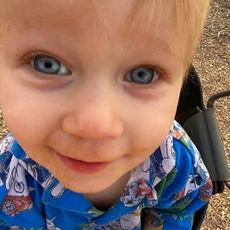 Malachi joined the competition — help win amazing prizes! toddler, child, blue_eyes, blonde_hair, smile, stroller, outdoor, sunny, shirt, cartoon, face, person, happy, playground, baby, cute, young_child, childhood, portrait, daylight