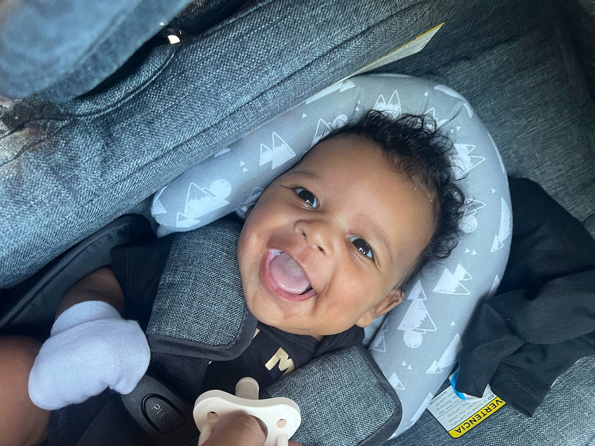 Jaiden is registered to the contest to win money with this photo: auto_part, baby, baby_carriage, baby_in_car_seat, baby_products, car_seat, cheek, child, comfort, electric_blue, finger, flash_photography, fun, gesture, happy, person, skin, smile, thumb, toddler