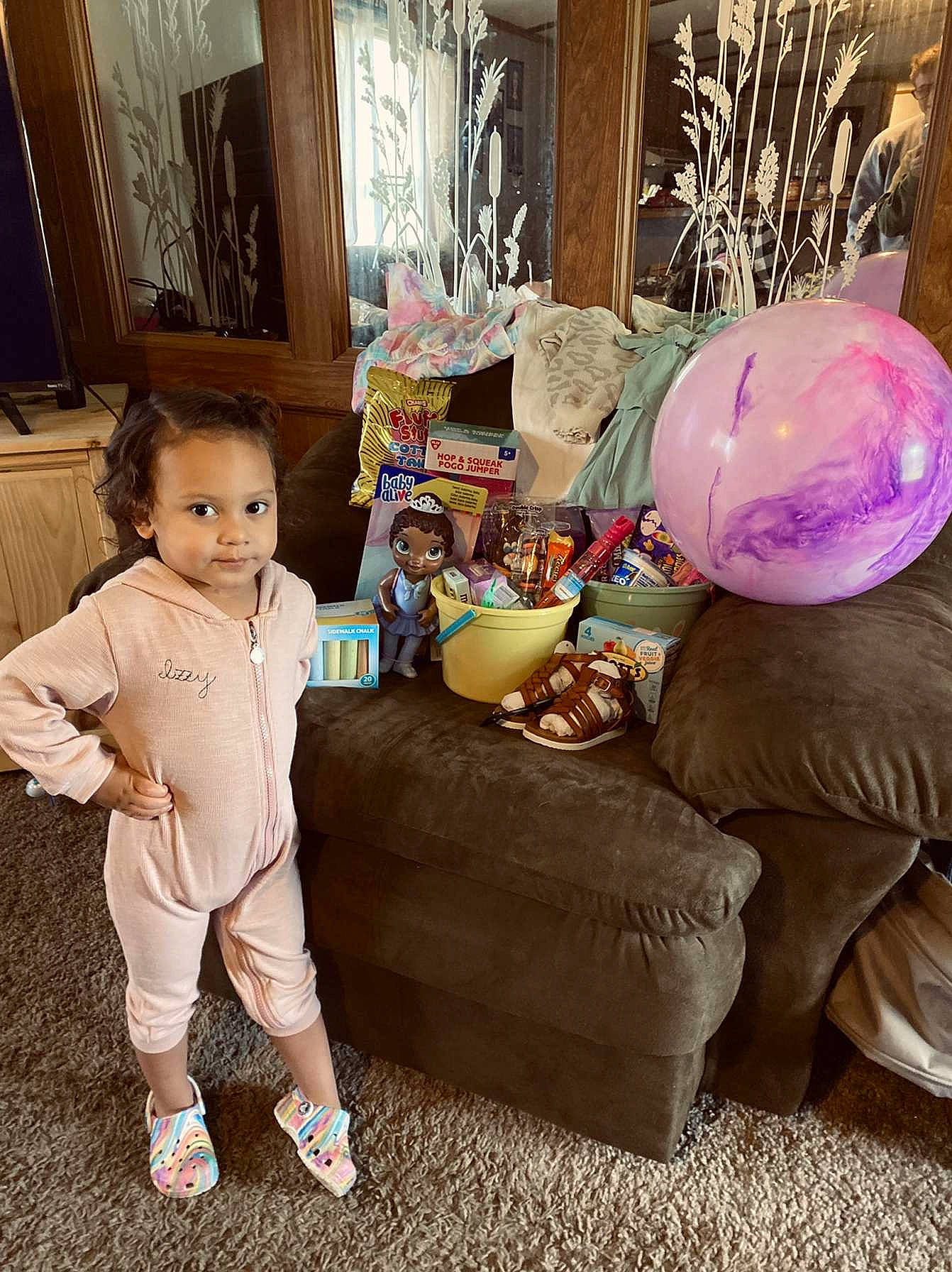 Izabelle is registered to the contest to win money with this photo: baby_toddler_clothing, bag, comfort, couch, curtain, event, floor, flooring, fur, hardwood, interior_design, living_room, person, picture_frame, pillow, room, sitting, studio_couch, textile, toddler