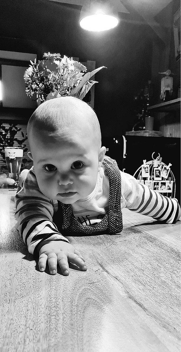 Jayson participe au concours pour gagner de l'argent avec cette photo : baby, black_and_white, child, fashion_accessory, flash_photography, flooring, fun, hand, happy, headpiece, monochrome, monochrome_photography, person, portrait_photography, room, sitting, still_life_photography, stock_photography, style, toddler