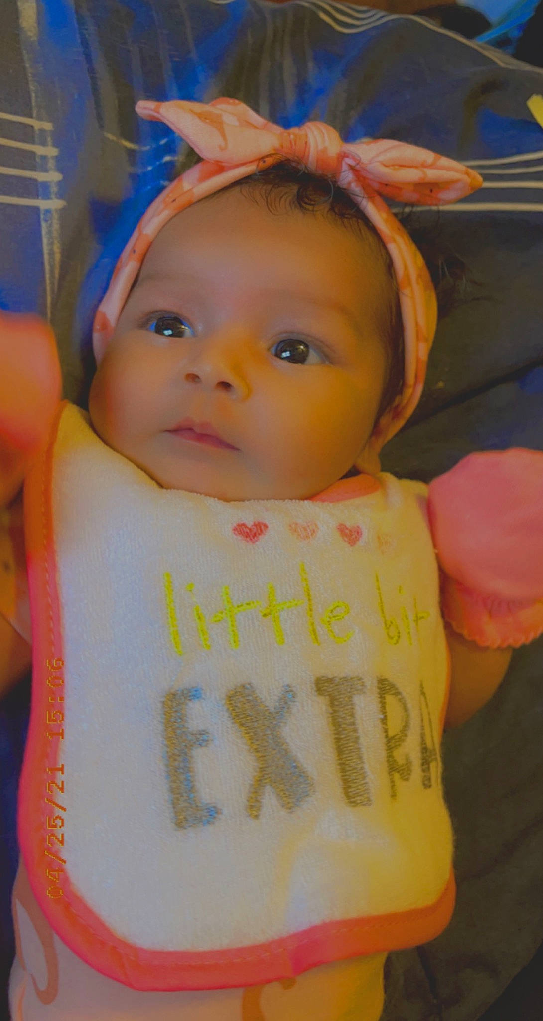 Novah joined the competition — help win amazing prizes! baby, baby_toddler_clothing, blue, cheek, chin, dress, eye, face, facial_expression, finger, forehead, happy, human_body, iris, lip, nose, person, pink, skin, textile