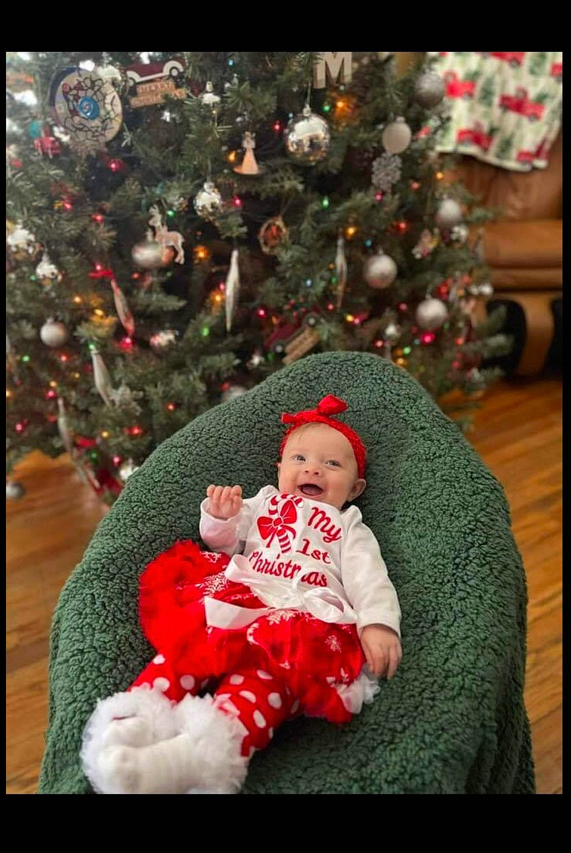 Octavia joined the competition — help win amazing prizes! baby, baby_toddler_clothing, christmas, christmas_decoration, christmas_eve, christmas_ornament, christmas_tree, conifer, event, evergreen, happy, headwear, holiday, holiday_ornament, human_body, interior_design, lap, ornament, person, plant