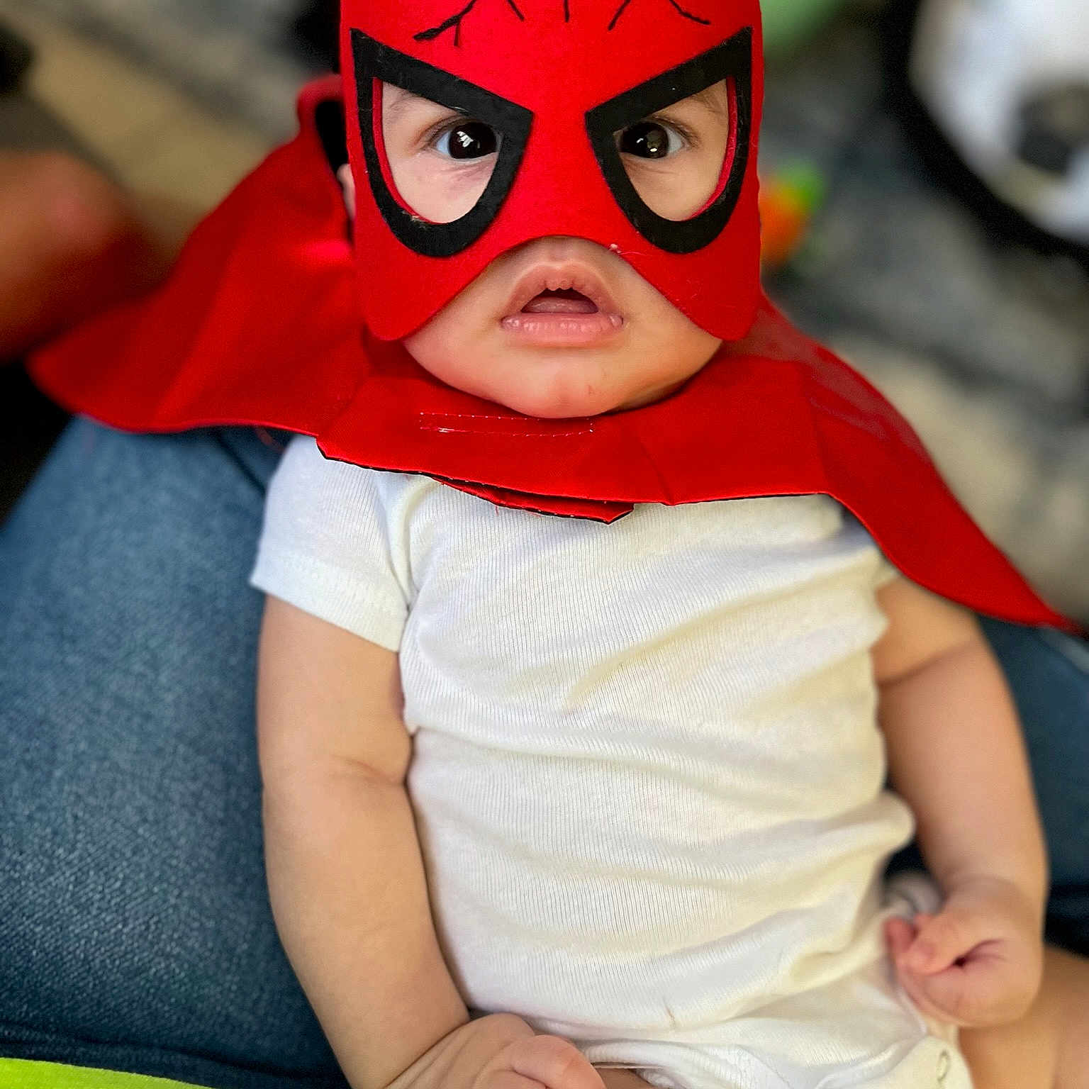 Kaedyn joined the competition — help win amazing prizes! baby, baby_toddler_clothing, carmine, child, event, eye, eyewear, fictional_character, happy, head, justice_league, mask, masque, orange, personal_protective_equipment, shield, skin, sleeve, toddler, yellow