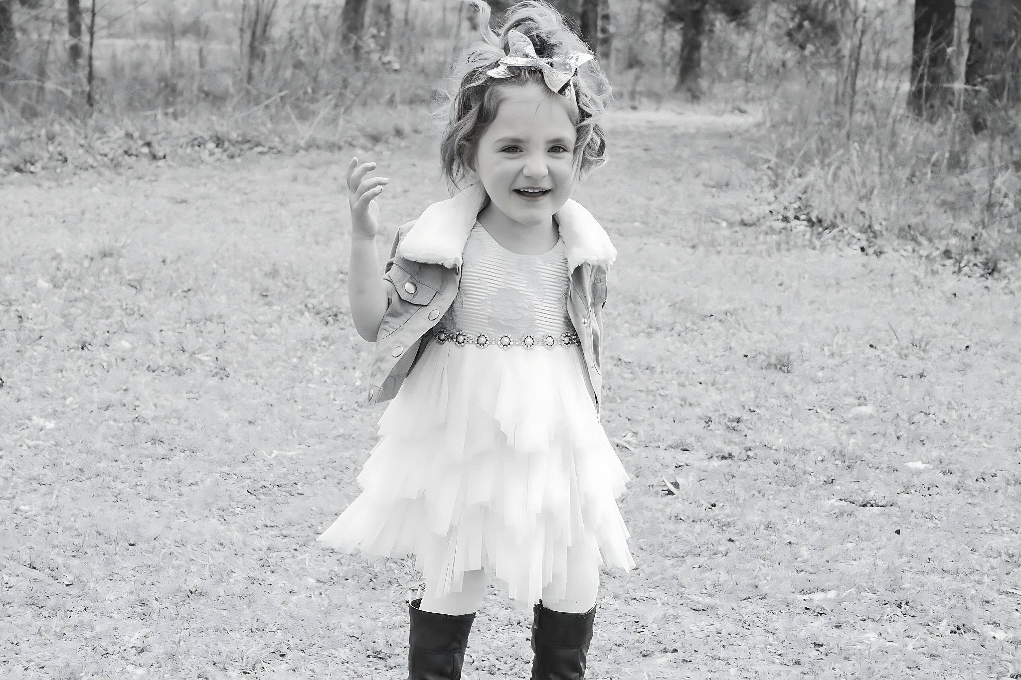 Ella-mae joined the competition — help win amazing prizes! baby, eye, face, facial_expression, fun, grass, hairstyle, happy, headgear, joy, monochrome, monochrome_photography, people_in_nature, person, plant, recreation, smile, standing, style, summer