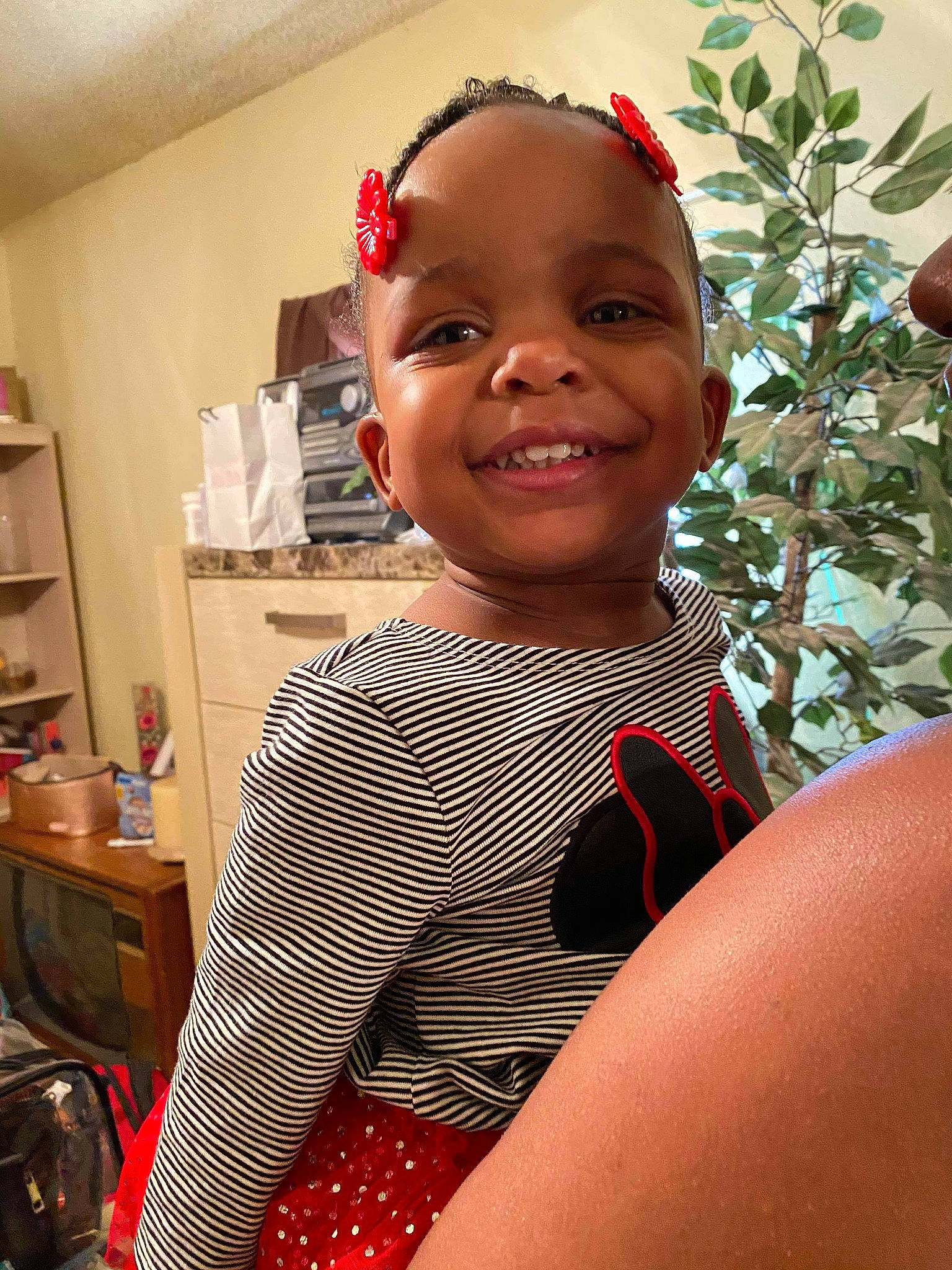Khalia joined the competition — help win amazing prizes! baby, baby_toddler_clothing, cabinetry, child, hair_accessory, headband, headpiece, home_appliance, joy, kitchen, kitchen_appliance, major_appliance, microwave_oven, oven, person, polka_dot, produce, red, shelf, shelving