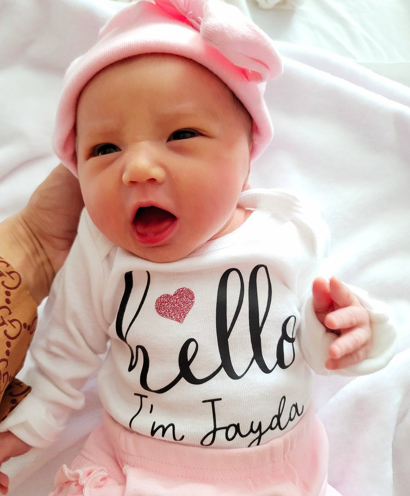 Jayda joined the competition — help win amazing prizes! baby, baby_sleeping, baby_toddler_clothing, cheek, child, chin, comfort, cool, face, finger, gesture, happy, headwear, linens, lip, person, pink, skin, sleeve, smile