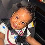 toddler, child, car_seat, seatbelt, smile, curly_hair, hairstyle, clothing, spiderman, indoor, car_interior, cute, happy, portrait, baby, person, black_hair, seat, young_child, safety