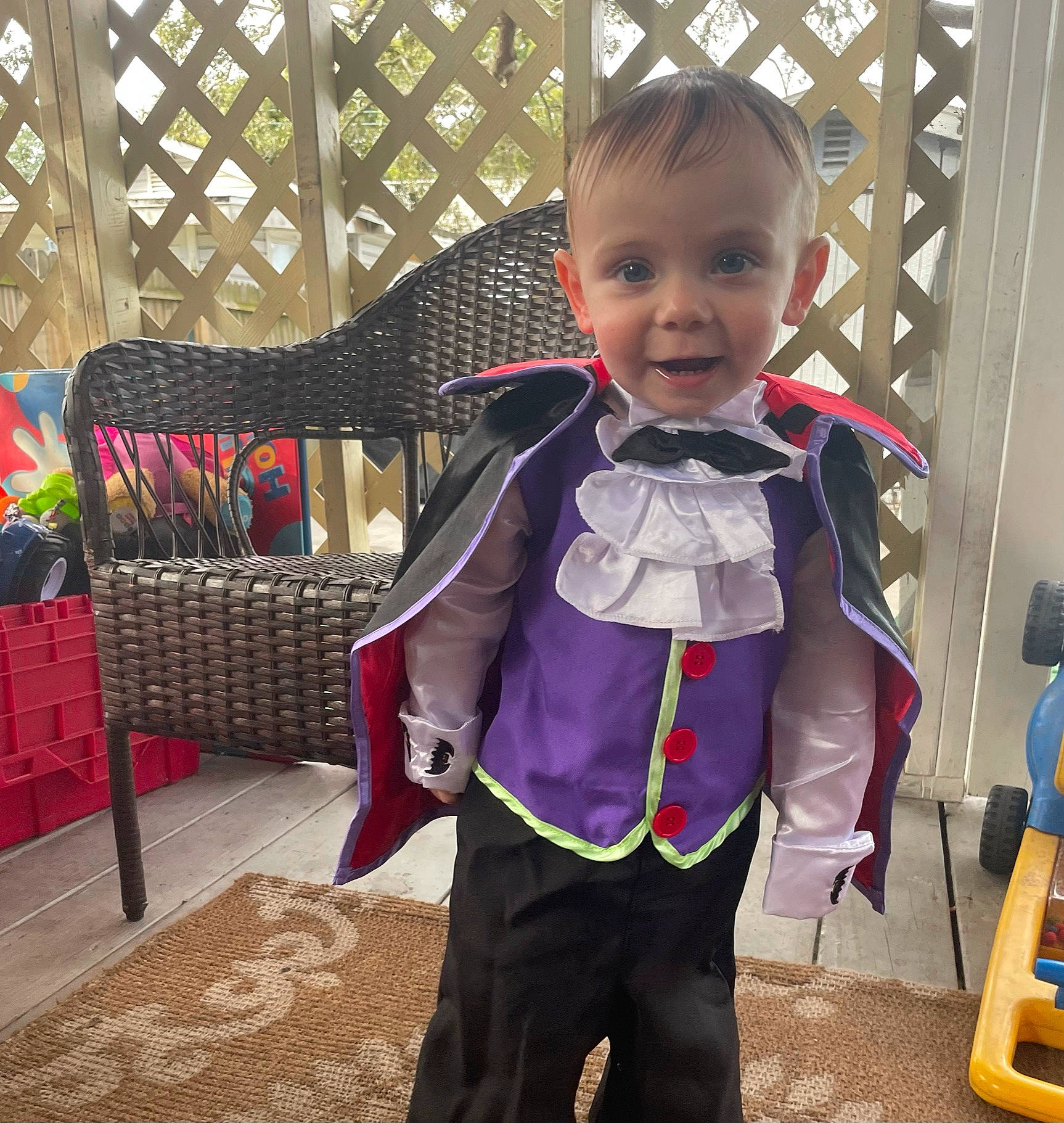 Jeremy is registered to the contest to win money with this photo: baby, baby_products, baby_toddler_clothing, child, costume, electric_blue, fashion_accessory, flooring, formal_wear, happy, magenta, pattern, person, sleeve, smile, toddler