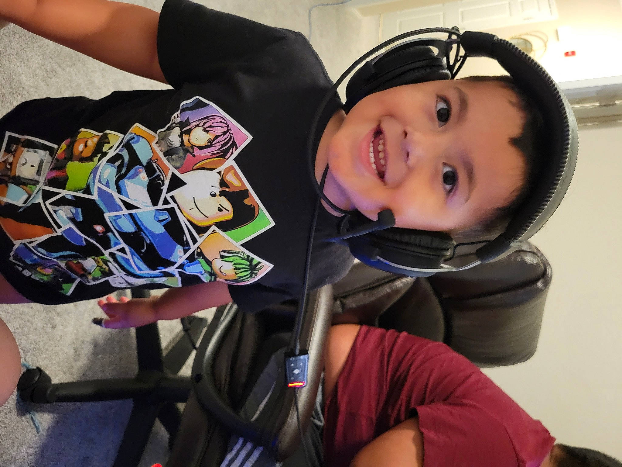 Anthony joined the competition — help win amazing prizes! auto_part, automotive_design, automotive_exterior, car_seat, child, comfort, cool, electronic_device, fun, happy, joy, motor_vehicle, person, personal_protective_equipment, product, recreation, smile, t_shirt, technology, toddler