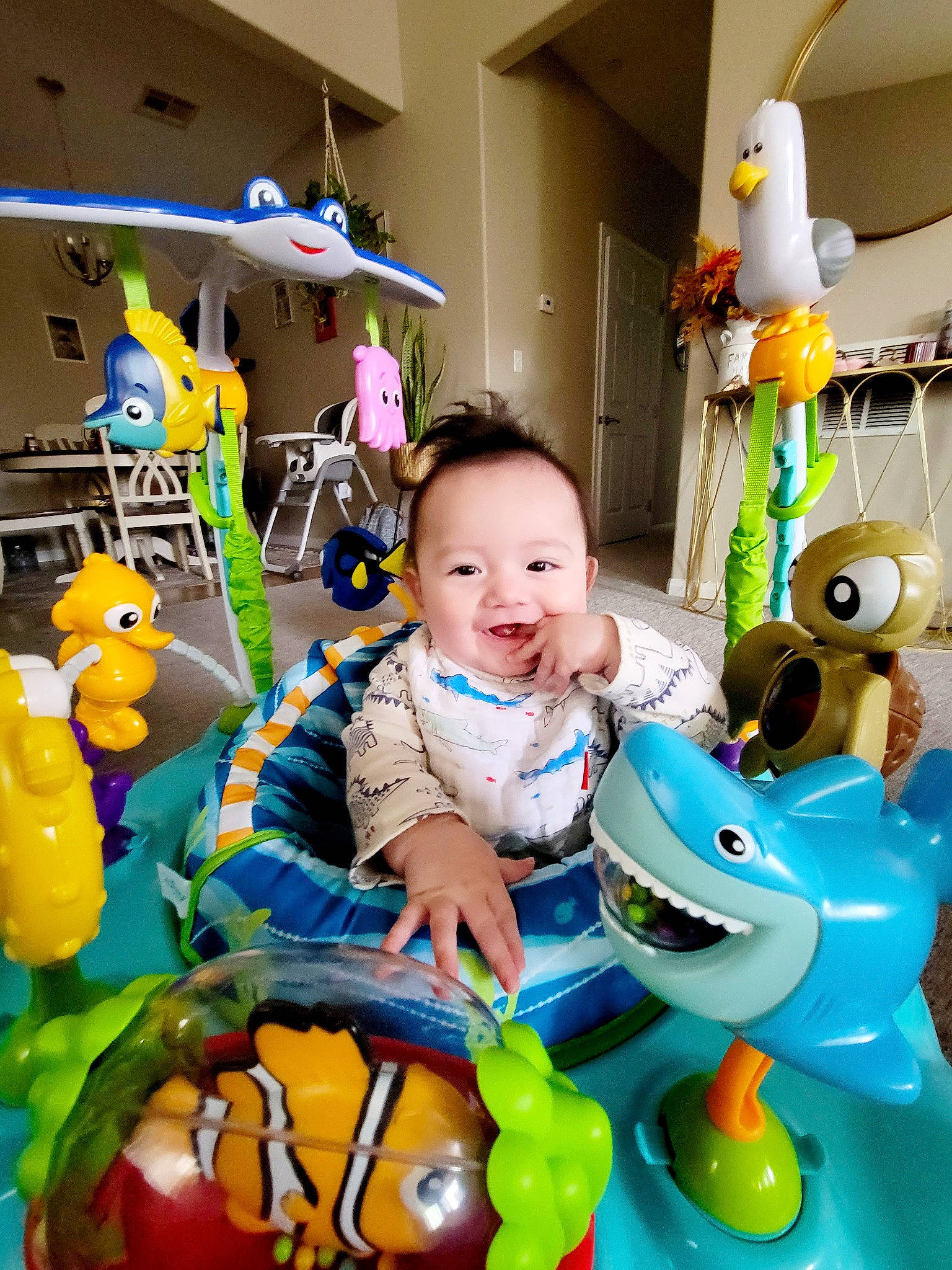 Louie is registered to the contest to win money with this photo: baby, baby_products, baby_toys, child, event, fun, happy, joy, leisure, person, photograph, play, public_space, recreation, smile, snapshot, stuffed_toy, t_shirt, toddler, toy
