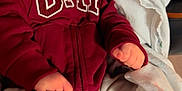 Emyr Gael joined the competition — help win amazing prizes! baby, child, smiling, hoodie, maroon, blanket, car_seat, clothing, happy, face, person, sitting, cute, infant, expression, warm, indoor, cozy, small_hands, legs