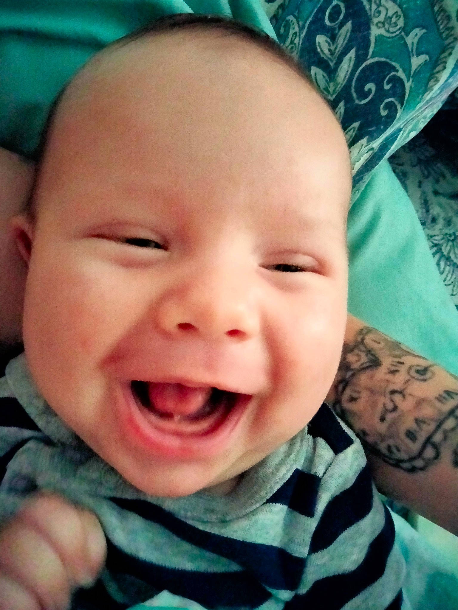 Camdyn is registered to the contest to win money with this photo: baby, blue, cheek, chin, eye, eyebrow, finger, gesture, green, happy, human, iris, lip, mouth, nose, organ, person, photograph, skin, smile